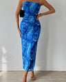Dress with rose print, pleats, lacing, and open back