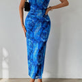 Dress with rose print, pleats, lacing, and open back