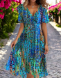 Rosalind - Loose dress with floral print and deep V-neck