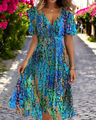 Rosalind - Loose dress with floral print and deep V-neck