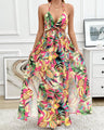 Dress with floral print and chain details, thigh slit and bow