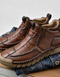 Retro leather men's boots with zipper, designed for comfort and waterproof, suitable for all seasons.