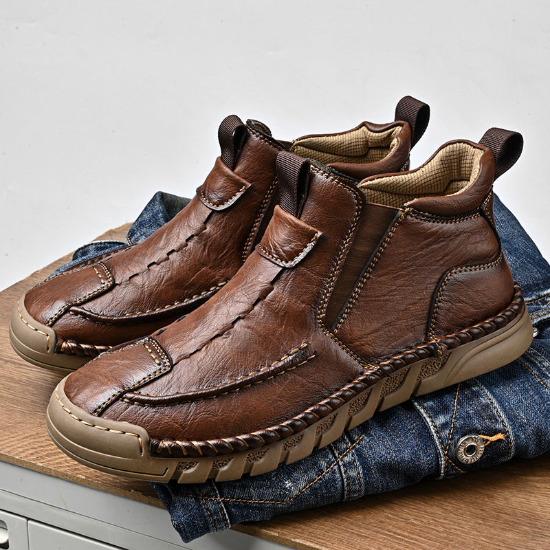 Retro leather men's boots with zipper, designed for comfort and waterproof, suitable for all seasons.