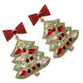 Christmas earring with gemstones in the shape of a Christmas tree in red, gold, and green.