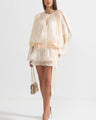 Luna mini dress with pleats and lantern sleeves