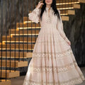 Elegant long dress with openwork embroidery and lace details