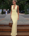 The Soleil open-back halter midi dress
