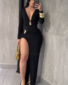 Elegant, form-fitting maxi dress with a deep V-neck, long sleeves, and pleats