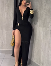 Elegant, form-fitting maxi dress with a deep V-neck, long sleeves, and pleats