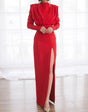 Solid pleated dress with a split at the back