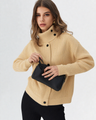 Asymmetric knit cardigan with button fastening