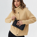 Asymmetric knit cardigan with button fastening