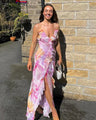 Maxi dress with irregular floral print and tassels
