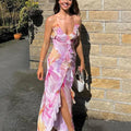 Maxi dress with irregular floral print and tassels