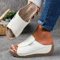 Comfortable leather sandals with a thick sole and arch support.