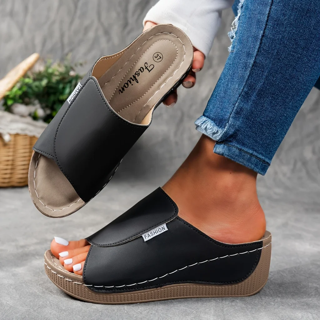 Comfortable leather sandals with a thick sole and arch support.