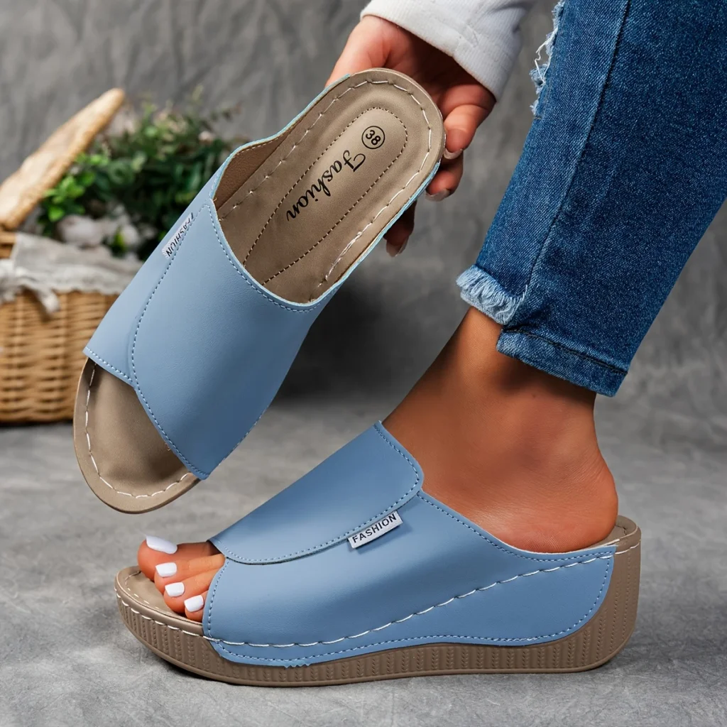Comfortable leather sandals with a thick sole and arch support.