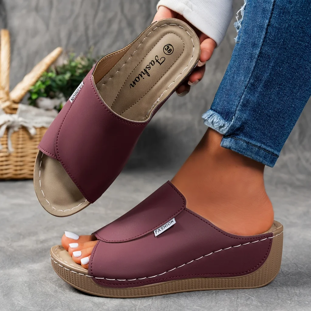 Comfortable leather sandals with a thick sole and arch support.