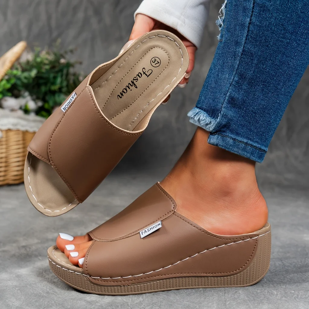 Comfortable leather sandals with a thick sole and arch support.