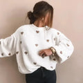 Sweater with heart print