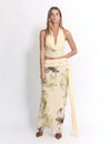 Midnight Muse halter neck top and high-slit skirt