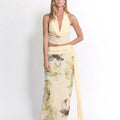 Midnight Muse halter neck top and high-slit skirt