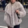 Coat with fur collar