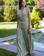 Isla Luxe – Printed jumpsuit with open back and wide legs