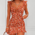Dress with floral print and ruffles on the straps